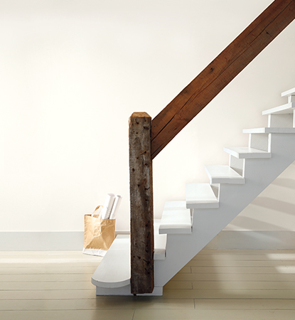 white staircase wood railing