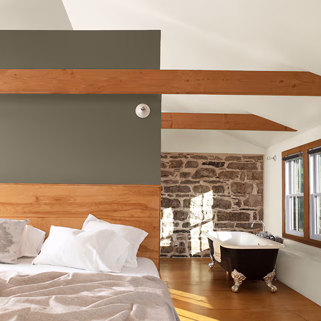 loft-bedroom-white-paint-green-accent-wall-650x650