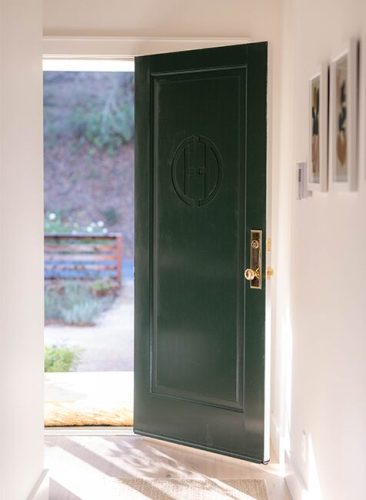 entryway-white-paint-open-dark-green-door-carousel