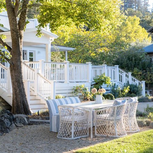 hoopes-house-white-paint-porch-dining-yard-carousel